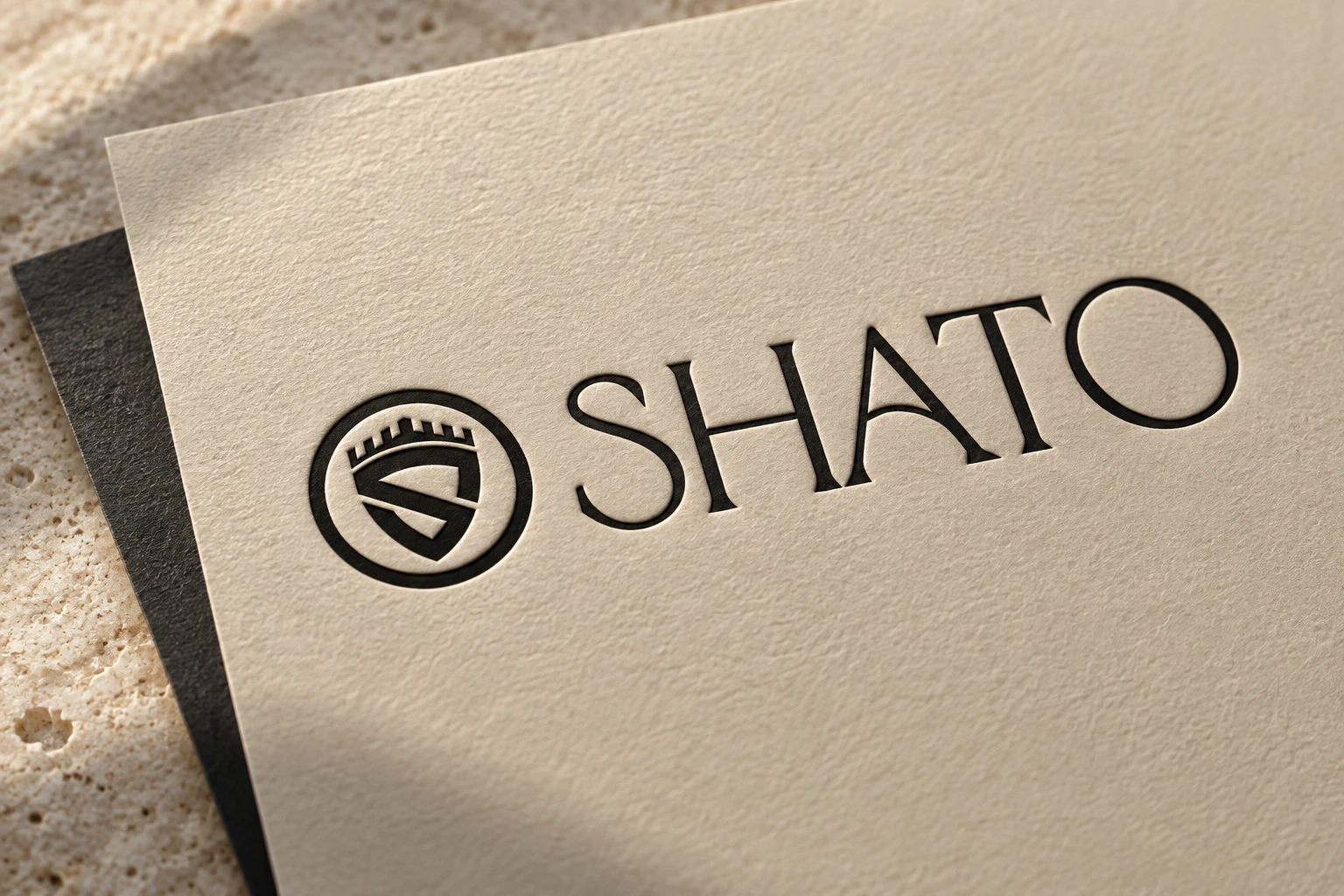 Shato merkidentiteit als papier- en reliëfstudie
